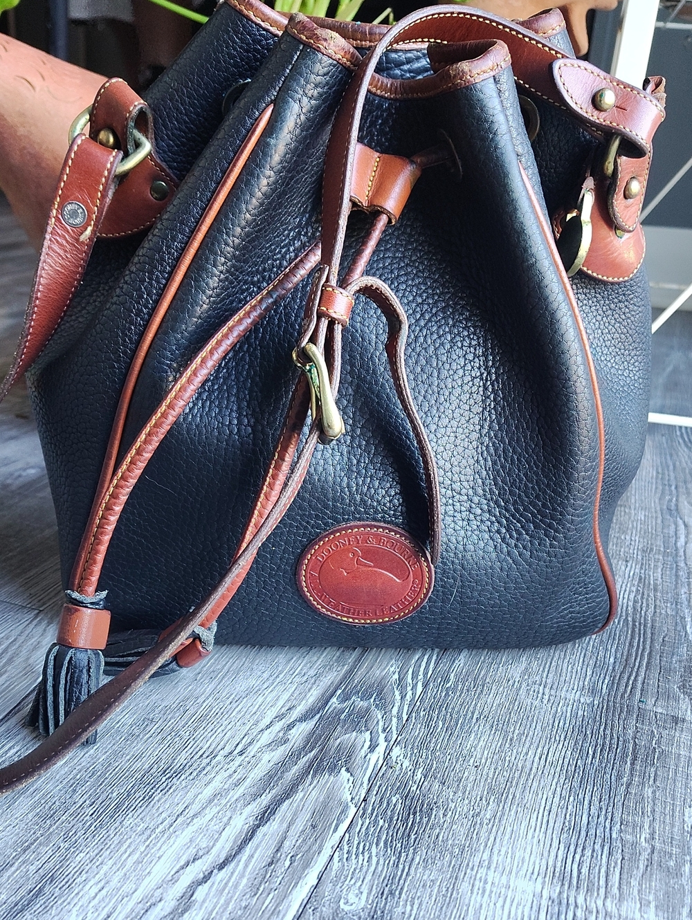 Vintage Dooney & Bourke Black Leather Drawstring Bucket Bag with Brown Trim